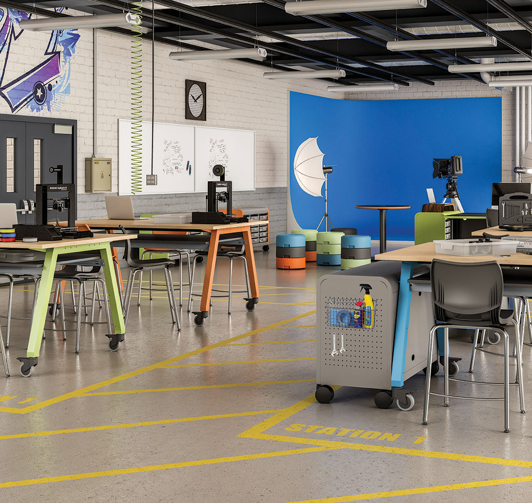 Art studio classroom with colorful tables and stools